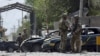 NATO-led Resolute Support forces inspect the site of a car bomb explosion in Kabul, Afghanistan, Sept. 5, 2019.