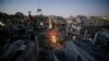  Una vista general de las casas dañadas que fueron destruidas por los ataques aéreos israelíes durante los combates Israel-Hamas en Gaza, 23 de mayo de 2021.