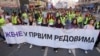 Women hold a banner reading "Women in front rows" during a march on International Women's Day in Belgrade, Serbia, on March 8, 2025.