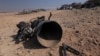Los restos del propulsor de un cohete que, según las autoridades israelíes, hirió gravemente a una niña de 7 años, después de que Irán lanzara drones y misiles hacia Israel, cerca de Arad, Israel, el 14 de abril de 2024.