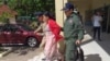 រូប​ឯកសារ៖ អ្នកស្រី ​ប៉ែន មុំ ​ដែល​ជា​សមាជិក​ក្រុម​ប្រឹក្សា​ឃុំ​កណ្តាល​  ស្រុក​ទឹកឈូ ​ខេត្ត​កំពត​ ត្រូវ​បាន​តុលាការ​ខេត្ត​កំពត​ក៏​បាន​សម្រេច​ផ្ដន្ទាទោសឲ្យ​ជាប់​ពន្ធនាគារ​៥​ឆ្នាំ​ពី​បទ​«រួម​គំនិត​ក្បត់» កាល​ពី​ថ្ងៃ​ទី៩ ខែកញ្ញា ឆ្នាំ​២០២០។ (រូបថត​ពី Facebook Mesa Love Lyma)