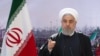 In this photo released by the official website of the office of the Iranian Presidency, President Hassan Rouhani addresses the nation in a televised speech in Tehran, Iran, Wednesday, Feb. 10, 2021. Rouhani said the West has no way except reaching…