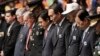 South Korea's Prime Minister Hwang Kyo-ahn, center, pays a silent tribute during a commemorative ceremony marking the 63rd anniversary of the Armistice Agreement and UN Forces Participation in the Korean War in Seoul, South Korea on July 27, 2016. 