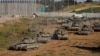 Xe tăng Israel di chuyển trên đường tới Gaza, gần biên giới Israel-Gaza, ở Israel, ngày 10 tháng 4 năm 2024.