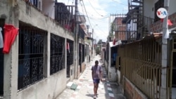 Trapos rojos en las fachadas de las casas del sector de Pizamos III, ubicado en la comuna 21 al oriente de la ciudad de Cali, Colombia. [Foto: Cortesía comunidad Pizamos III]