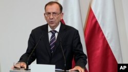 Глава МВД Польши и координатор польских спецслужб Мариуш Каминский (архивное фото)