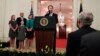 Supreme Court Justice Brett Kavanaugh speaks after a ceremonial swearing-in in the East Room of the White House in Washington, Oct. 8, 2018, as Senate Majority Leader Mitch McConnell looks on, right. On the dais is President Donald Trump, wife Ashley Kavanaugh and daughters Margaret, left, and Liza. 