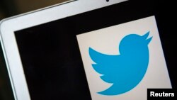 FILE - A portrait of the Twitter logo in Ventura, California.