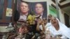 Supporters of Pakistani former Prime Minister Nawaz Sharif shout anti-government slogans outside a hospital where Sharif was admitted in Lahore, Pakistan, Oct. 24, 2019.