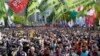 Trabajadores y activistas en Asia y Europa piden más derechos laborales en marchas del 1 de Mayo