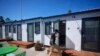 FILE: Steven Burcell walks to his room at the Five Keys' Mission Cabins transitional housing location in San Francisco, Aug. 26, 2024. 
