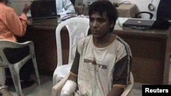 Mohammed Ajmal Kasab, the lone surviving suspected gunman in the 2008 Mumbai attacks, is under police custody at an undisclosed location in this undated photo, February 3, 2009. 
