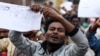 A protester chants slogans during a demonstration over what they say is unfair distribution of wealth in the country at Meskel Square in Ethiopia's capital, Addis Ababa, Aug. 6, 2016. 