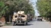 Afghan security forces arrive during a fight against Taliban fighters in Kunduz province north of Kabul, Afghanistan, Aug. 31, 2019. The Taliban have launched a new large-scale attack on one of Afghanistan's main cities, Kunduz.