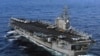 FILE - USS Ronald Reagan is directed to Japan following a 8.9 earthquake and tsunami to render humanitarian assistance and disaster relief, March 12, 2011.