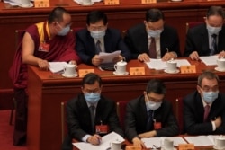 Sesiones de una reunión de las autoridades comunistas chinas se celebran este jueves 4 de marzo de 2021.