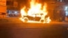 Un coche arde en Bagdad, Irak, el 7 de febrero de 2024, en esta captura de pantalla obtenida de un vídeo de las redes sociales.