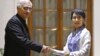 Burma opposition leader Aung San Suu Kyi, and Indian Foreign Minister Salman Khurshid pose for the media before a meeting in New Delhi, India, November 15, 2012.