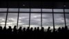 Filipina workers returning home from Kuwait arrive at Manila International Airport on February 18, 2018.