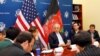 FILE - U.S. special envoy for peace in Afghanistan, Zalmay Khalilzad, center, speaks during a discussion with Afghan media at the U.S Embassy in Kabul, Afghanistan Jan. 28, 2019. 