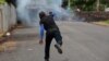 A demonstrator throws a homemade device during the funeral service of Jose Esteban Sevilla Medina, who died during clashes with pro-government supporters in Monimbo, Nicaragua, July 16, 2018.