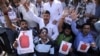 Activists of People’s Democratic Party shout slogans during a protest in Jammu, India, September 19, 2012. 