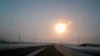A dashboard camera on a highway in the Chelyabinsk region of Russia, captured a meteorite streaking across the sky on Feb. 15, 2013.