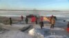 Annual Winter Fishing Festival Under a Frozen Lake in China
