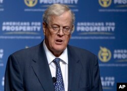 FILE - Americans for Prosperity Foundation Chairman David Koch speaks in Orlando, Fla., Aug. 30, 2013. David Koch and his brother Charles plan to spend millions to promote the recently signed tax overhaul. FILE - Americans for Prosperity Foundation Chairman David Koch speaks in Orlando, Fla., Aug. 30, 2013.