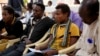 FILE - Ethiopian migrants gather at the International Organization for Migration center in the port city of Aden, Yemen, Jan. 2, 2017.