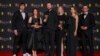 Fotógrafos, editores y productores de The Associated Press ganadores del premio a mejor documental por '20 Days in Mariupol', en los premios BAFTA, en Londres el domingo 18 de febrero de 2024. 