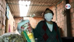 María Olga es una habitante del municipio colombiano de Soacha, que recibe ayuda de alimentación, por parte de las autoridades locales. [Foto: Karen Sánchez]