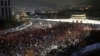 South Korean protesters march toward the presidential house during a rally calling for South Korean President Park Geun-hye to step down in Seoul, South Korea, Nov. 19, 2016.
