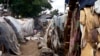 FILE - A view of a refugee camp situated in between a school and a Catholic church in Kiwanja, Rutshuru town, North Kivu on May 4, 2018. 
