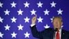 FILE - President Donald Trump speaks at a fundraiser in Fargo, N.D., Sept. 7, 2018. Trump is assailing investigative journalist Bob Woodward's book about him and his White House as 'just another assault against me, in a barrage of assaults.'