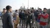 Los reporteros realizan la cobertura de una explosión en Kabul el 2 de febrero de 2021. Dos personas murieron entonces, según informaron las autoridades.