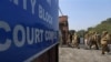 Policemen are deployed in a district court where the accused in a gang rape of a 23-year-old woman are to be tried, New Delhi, Jan. 21, 2013. 