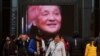 2018年11月14日，北京中国国家博物馆举办的中国改革开放40周年展览中，人们参观关于中国前领导人邓小平的内容。