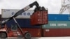 Containers of China Shipping and Cosco are loaded at a port in Ho Chi Minh City, Vietnam, July 27, 2018. 