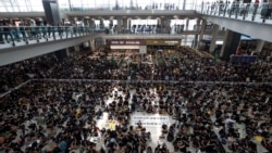 VOA Asia - Flights are grounded in Hong Kong, but the airport is full