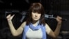 RUSSIA -- Maria Butina, a gun-rights activist, poses for a photo at a shooting range in Moscow, April 22, 2012.