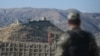 FILE - A Pakistani army soldier stands guard at a border post in Ghulam Khan, North Waziristan, on the border between Pakistan and Afghanistan, Jan. 27, 2019.