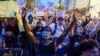 Demonstrators protest, Thursday, June 4, 2020, near the White House in Washington, over the death of George Floyd, a black man who was in police custody in Minneapolis. Floyd died after being restrained by Minneapolis police officers.