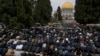 Muslim worshippers perform Friday prayers at the Al-Aqsa Mosque compound in the Old City of Jerusalem during the holy month of Ramadan, March 7, 2025.