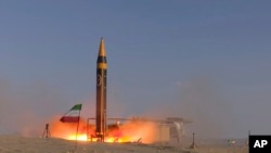 FILE - A missile is launched at an undisclosed location in Iran on May 25, 2023. The U.S. on Oct. 18 imposed sanctions on people and firms tied to the development of Iran's ballistic missile program. (Iranian Defense Ministry via AP)