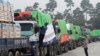 FILE - South Korean trucks with food aid prepare to leave for North Korean city of Kaesong in Paju, South Korea, Sept. 21, 2012. 