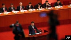 中共总书记习近平在北京人大会堂召开的中共19大开幕式上发表讲话。（2017年10月18日）