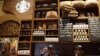Indian employees of the newly inaugurated first India outlet of Starbucks work at a counter in Mumbai, India, October 19, 2012.