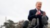 FILE - President Donald Trump speaks to reporters before boarding Marine One on the South Lawn of the White House in Washington, Nov. 26, 2018.