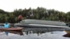 Long boat milik Taman Nasional Sebangau yang terlibat kecelakaan dengan speed boat TNI AD di Sungai Sebangau, Kota Palangkaraya, Kalimantan Tengah, Senin 9 Maret 2020. (courtesy: Basarnas)